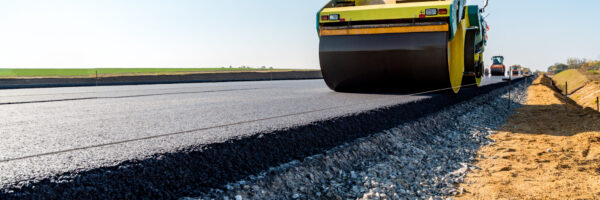 Road rollers building the new asphalt road